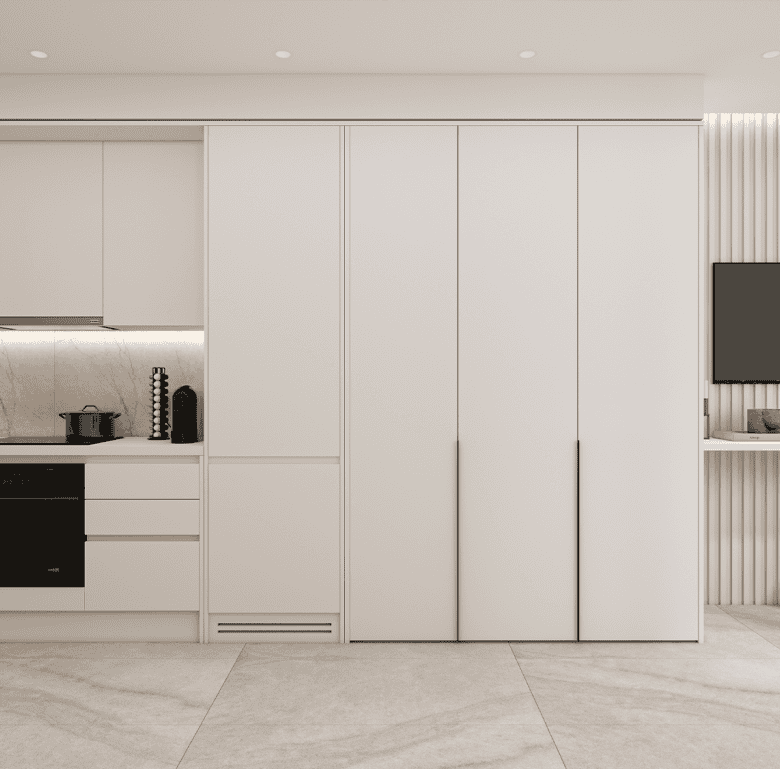 Modern kitchen interior in Athens, Greece, with sleek white cabinetry and minimalist design.