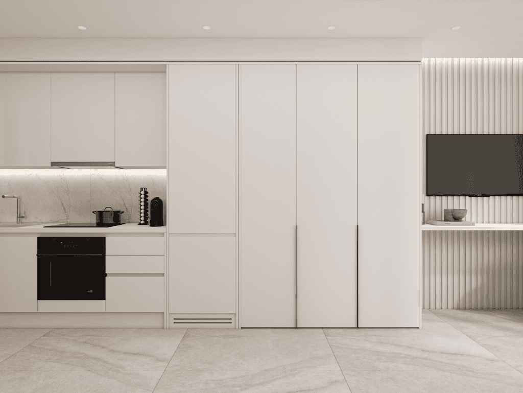 Modern kitchen interior in Athens, Greece, with sleek white cabinetry and minimalist design.