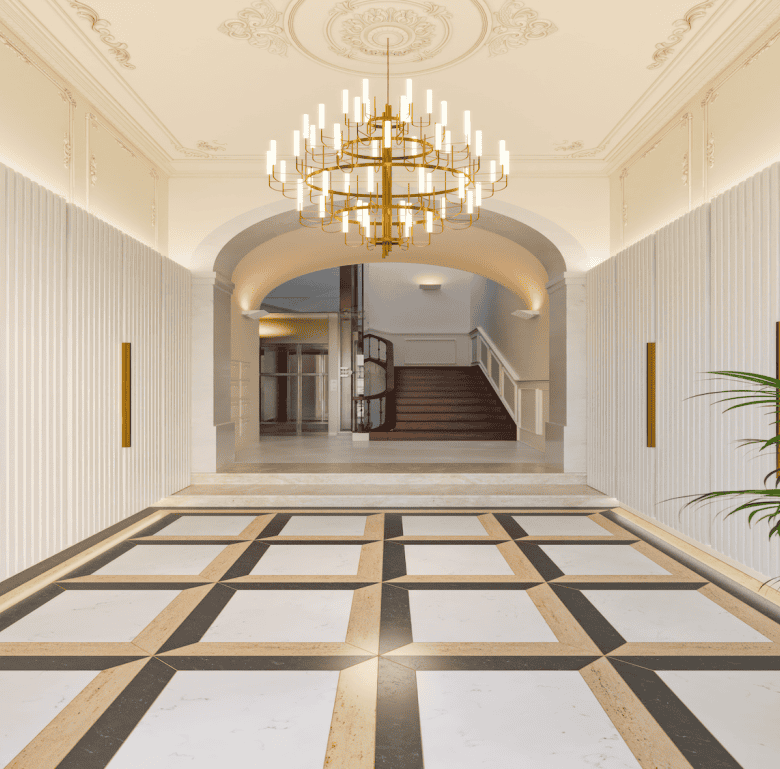 Elegant Lisbon hotel lobby with classic decor and modern lighting fixtures.