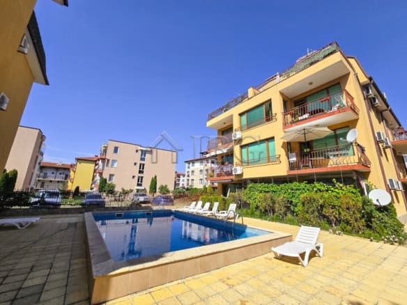 Apartment with pool, balcony, and sea view in Nessebar, Bulgaria.
