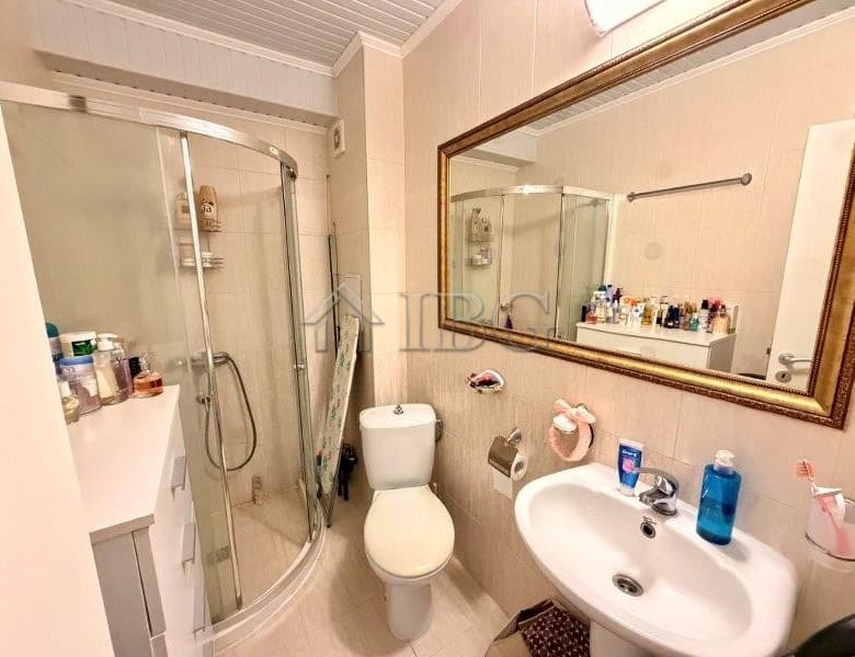 Modern bathroom with shower, toilet, and sink in Melia Resort Nessebar.