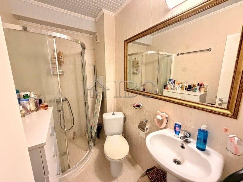 Modern bathroom with shower, toilet, and sink in Melia Resort Nessebar.