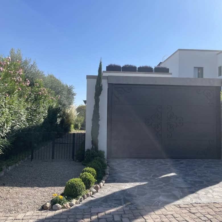 Elegant villa featuring a private garden, swimming pool, and contemporary design. Perfect for luxuri.