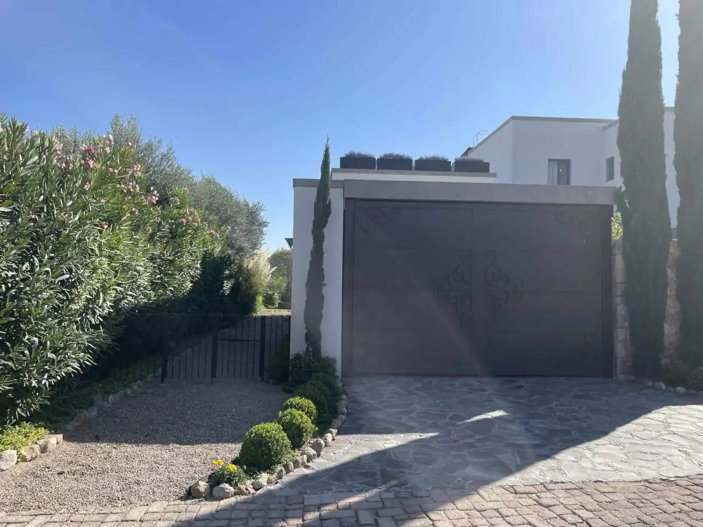 Elegant villa featuring a private garden, swimming pool, and contemporary design. Perfect for luxuri.
