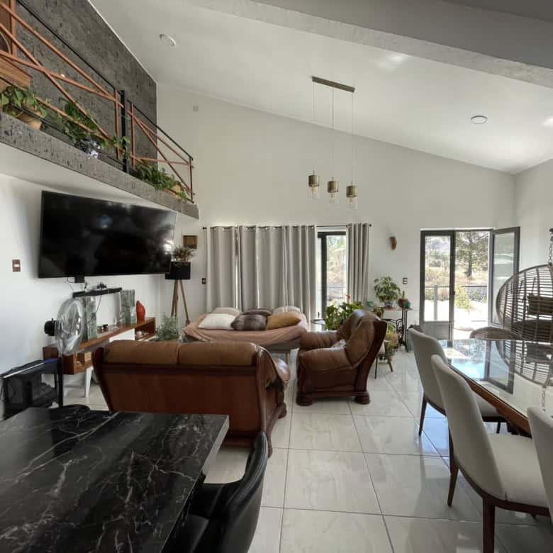 Bright and airy living room with comfortable furniture and natural light.