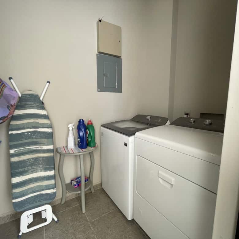 Laundry room featuring a washing machine and dryer setup for convenient household chores.