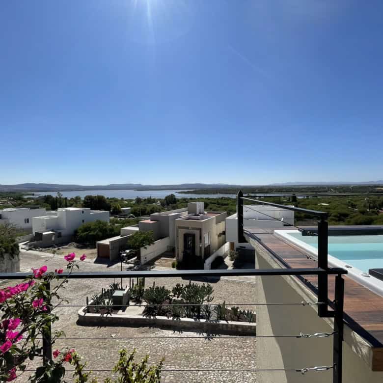 Luxury villa with private pool overlooking scenic landscape.