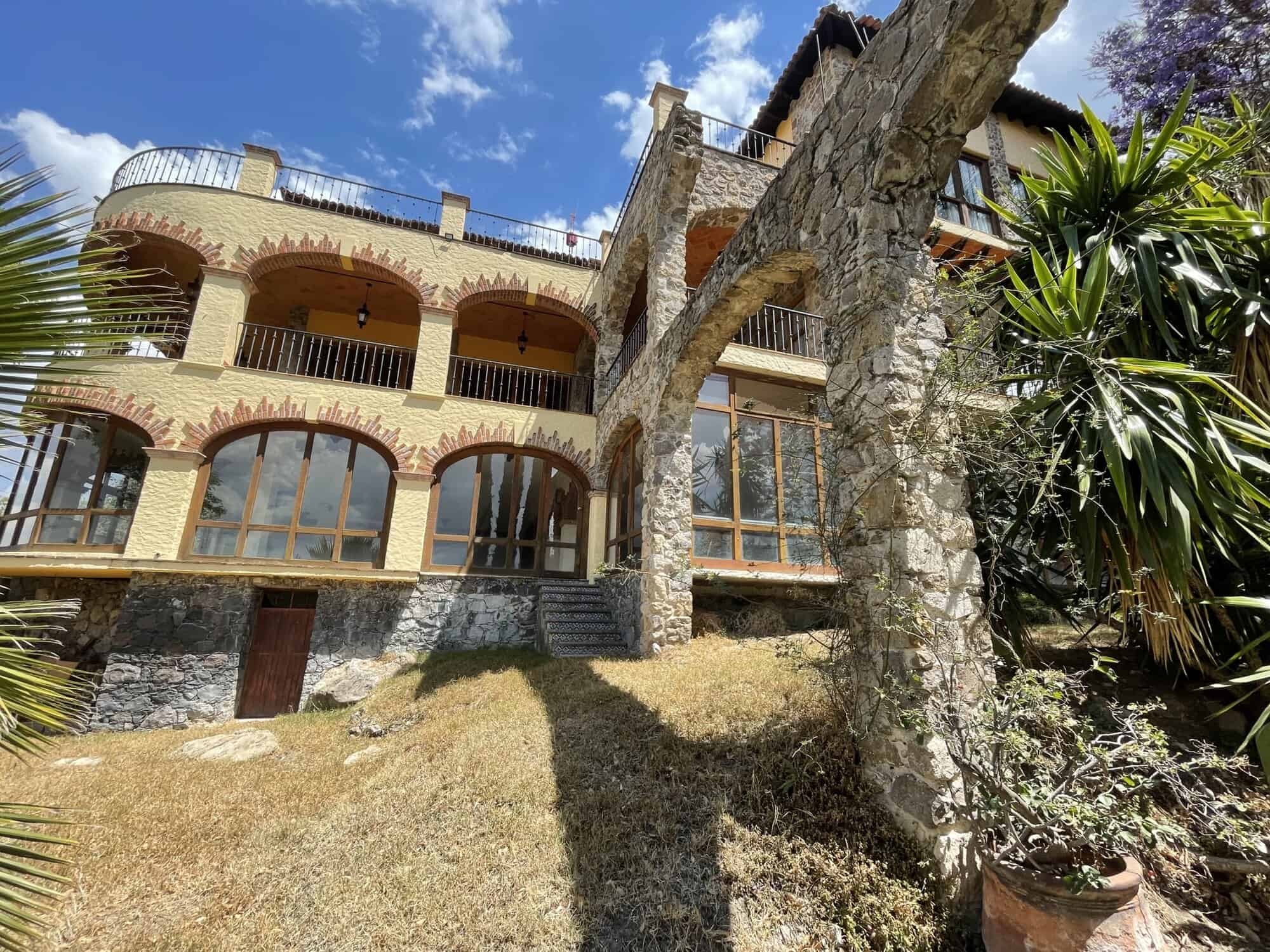 Luxury hillside villa with panoramic views of the surrounding landscape.