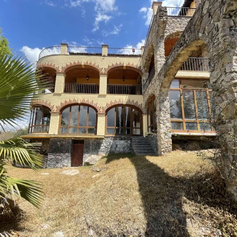 Seaside villa featuring panoramic ocean views, multiple terraces, and lush landscaping. Perfect for.