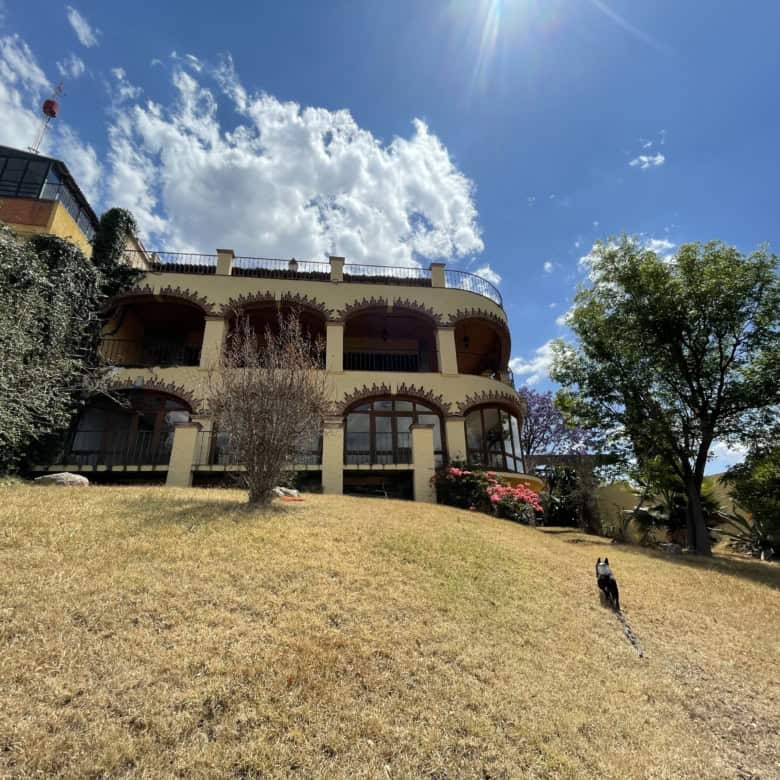 Luxury villa featuring a lush garden and spacious terraces in a serene location. Perfect for comfort.