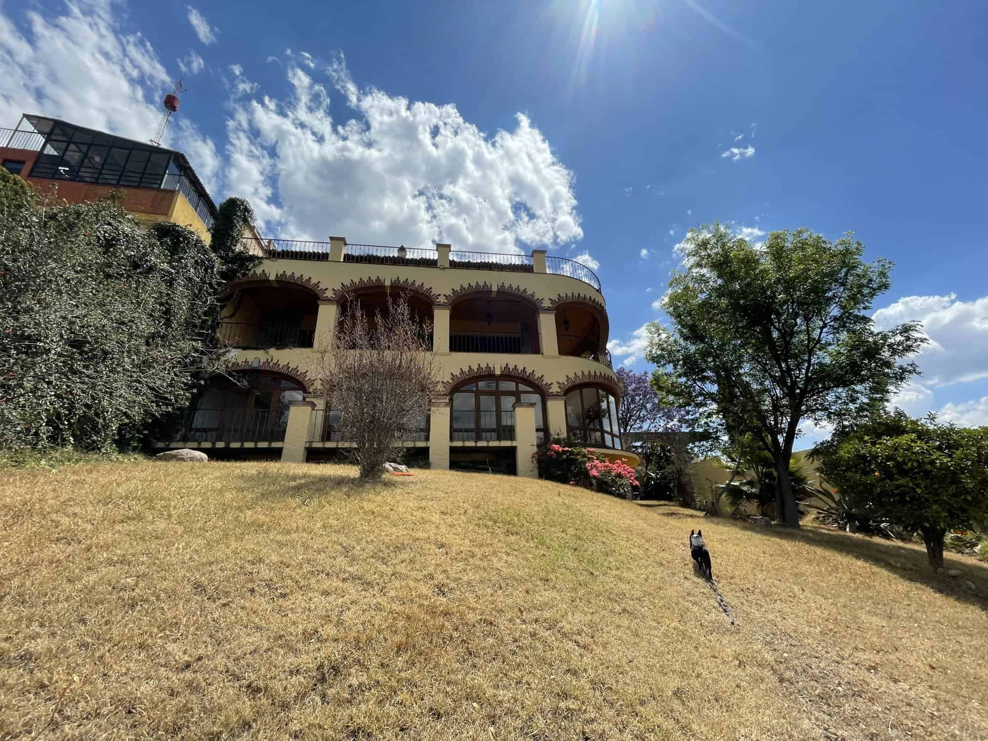 Luxury villa featuring a lush garden and spacious terraces in a serene location. Perfect for comfort.