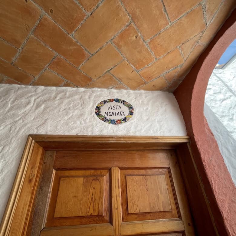 Doorway leading to a mountain view room.