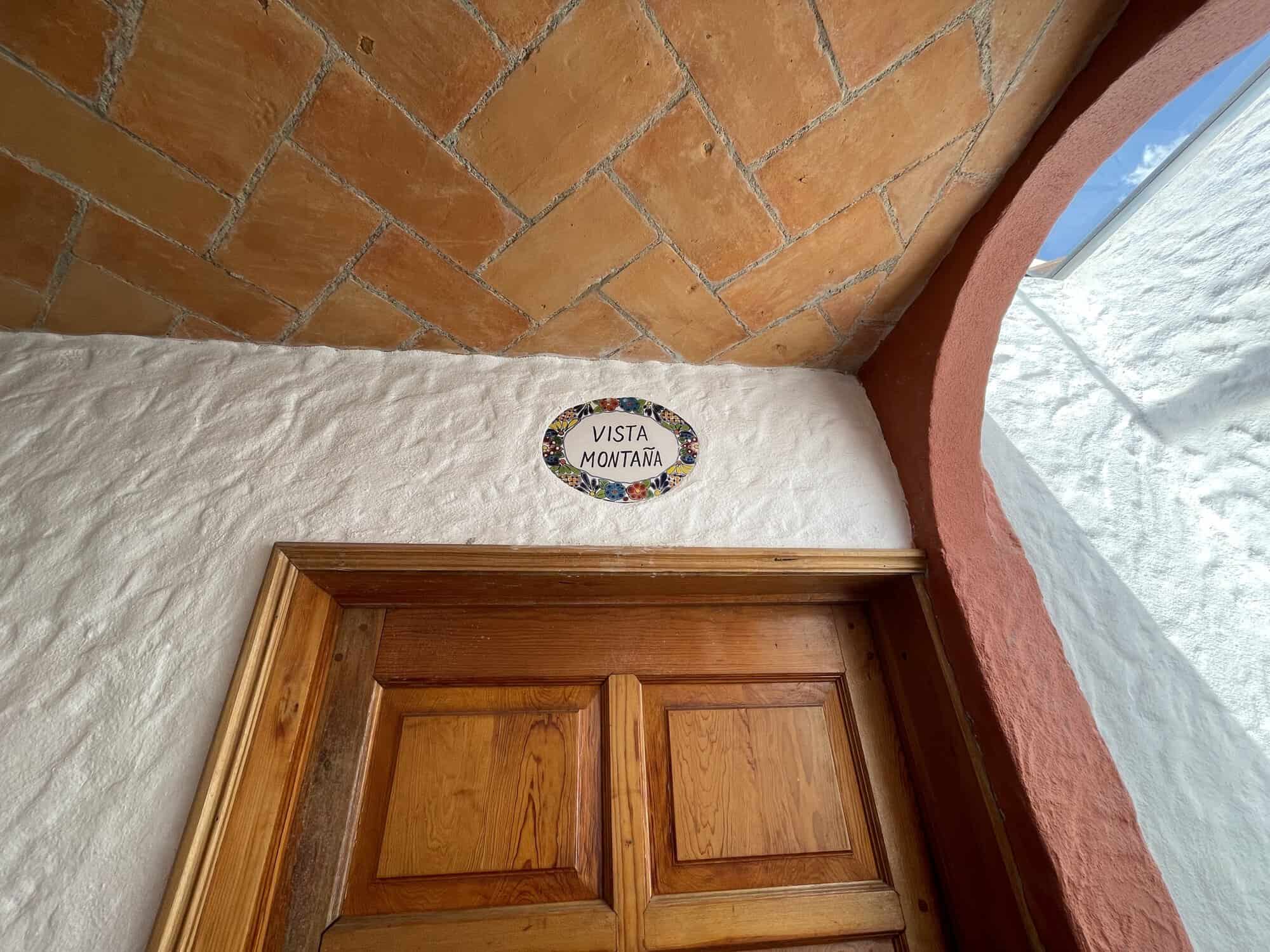 Doorway leading to a mountain view room.