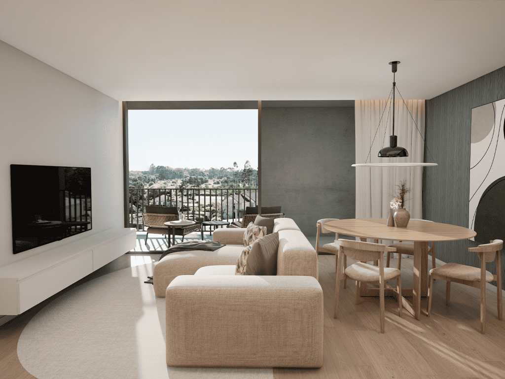 Bright living room with large window overlooking lush landscape in Viana do Castelo, Portugal.