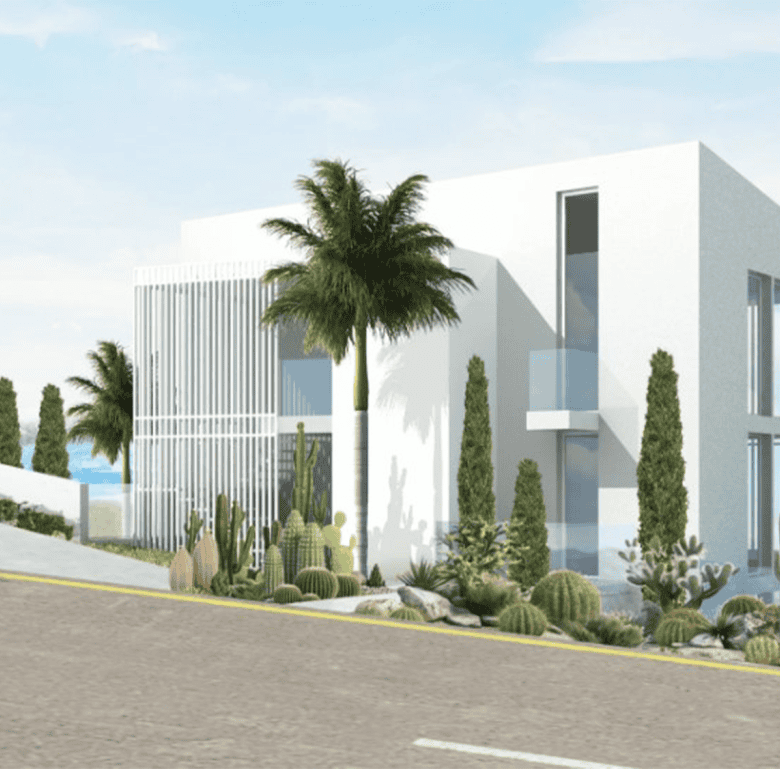 Contemporary white villa with palm trees near Chamolia Beach, Athens, Greece.