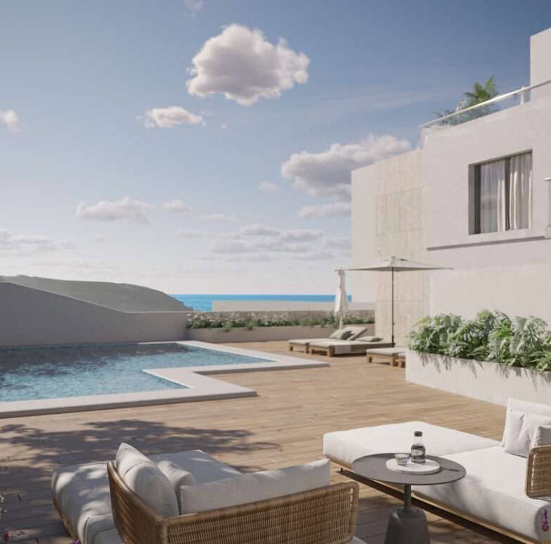 Sea view terrace with pool and outdoor seating in São Bernardino, Portugal.