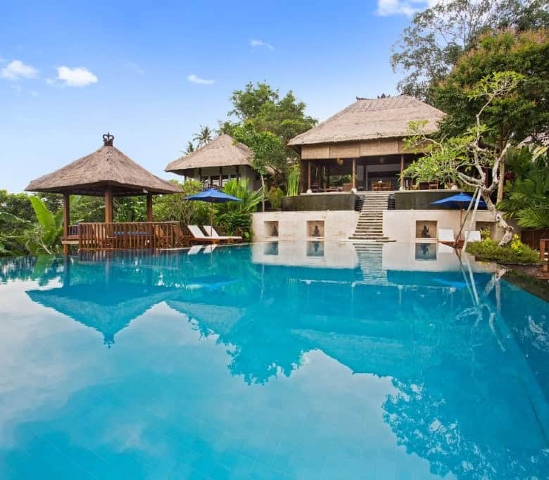 Stunning Bali villa with infinity pool, lush gardens, and traditional architecture in Ubud.