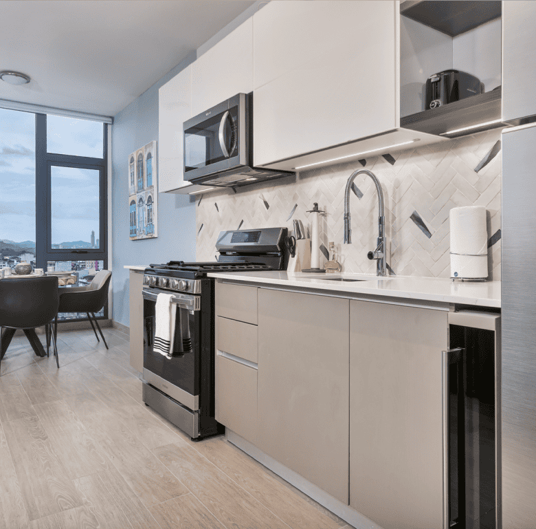 Modern kitchen with appliances and cityscape in Panama City, Panama.