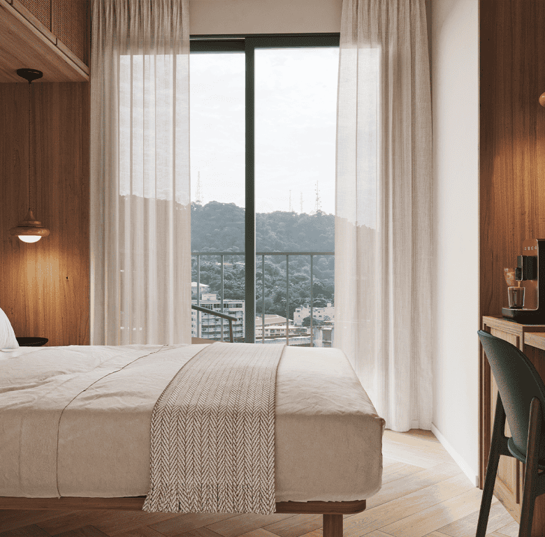 Spacious hotel bedroom featuring a large window with city views in La Central, Panama City.