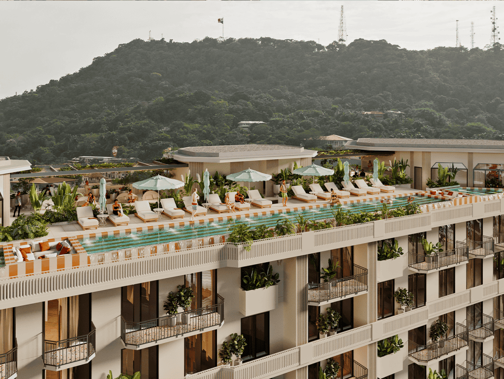 Modern apartment building with rooftop pool and lounge area in Panama City, Panama.