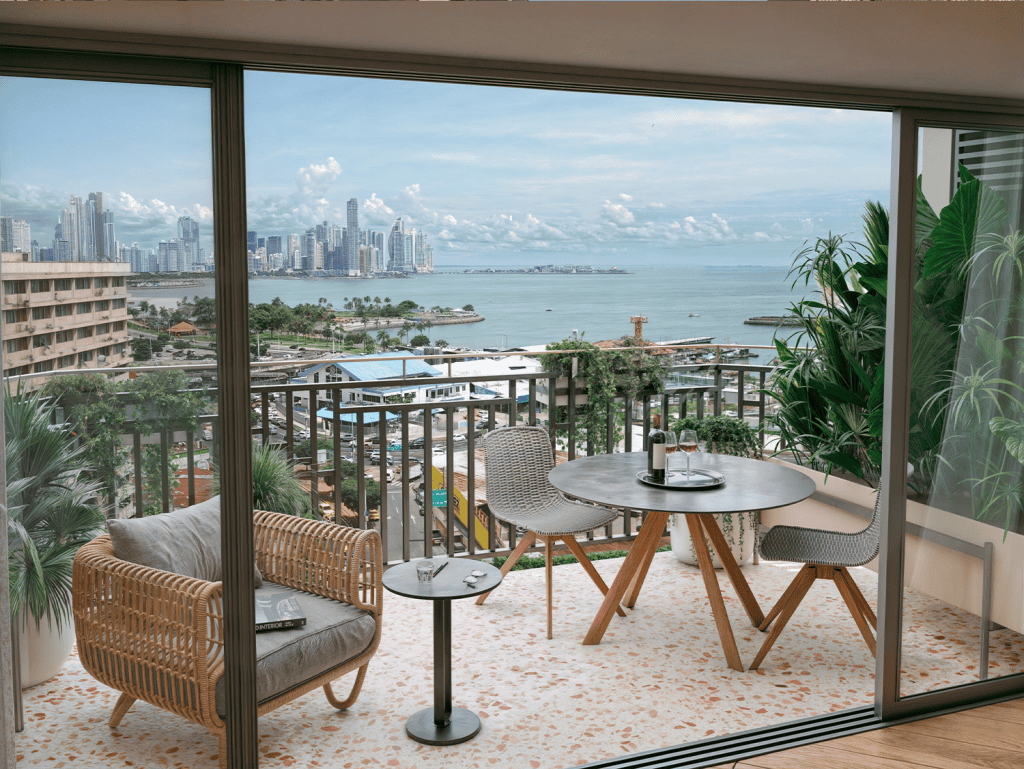 Balcony overlooking La Union, Panama City with city skyline and ocean view.