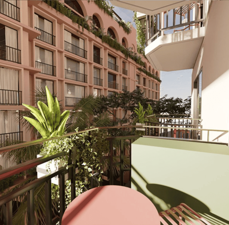 Balcony view of Panama City with tropical plants and urban architecture.