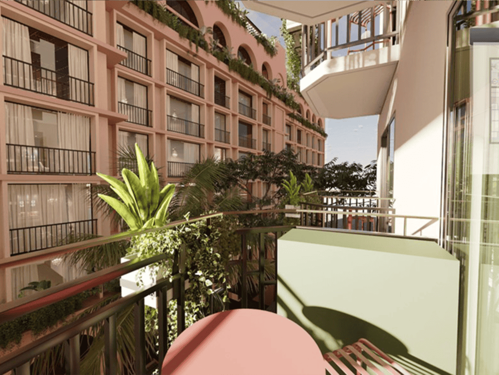Balcony view of Panama City with tropical plants and urban architecture.