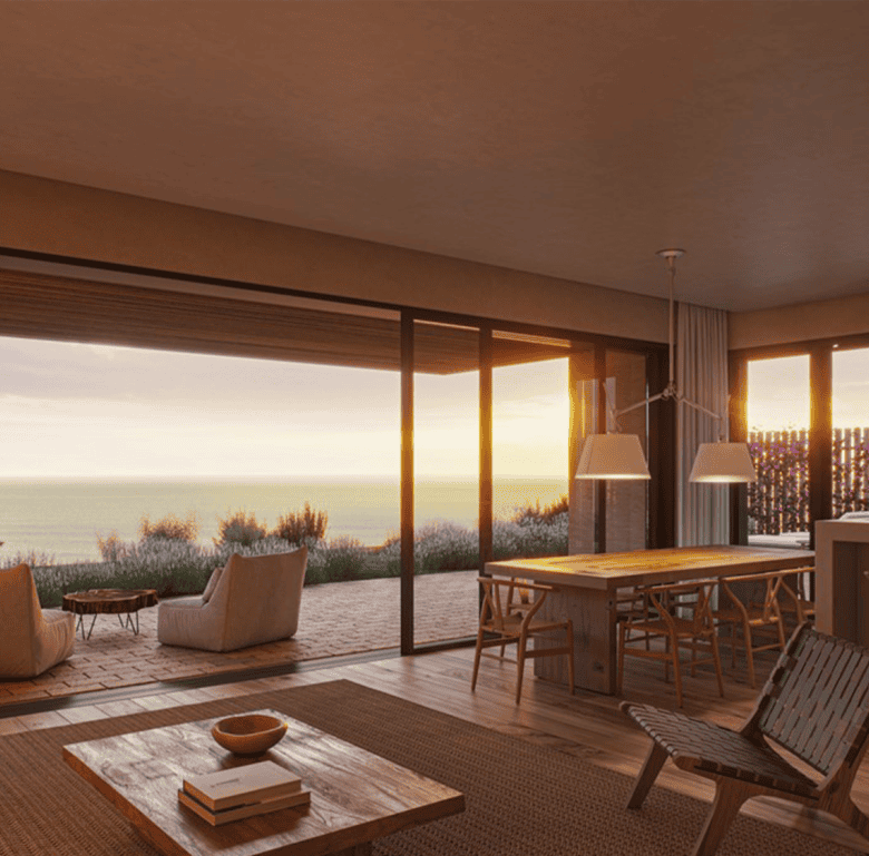 Sea view living room in Porto Covo, Sines, Portugal with modern furniture and large glass doors.