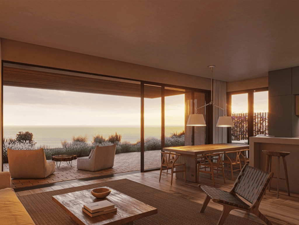 Sea view living room in Porto Covo, Sines, Portugal with modern furniture and large glass doors.