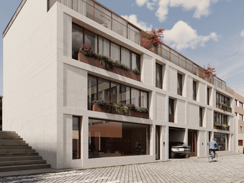 Modern Porto apartment building with balconies and greenery.