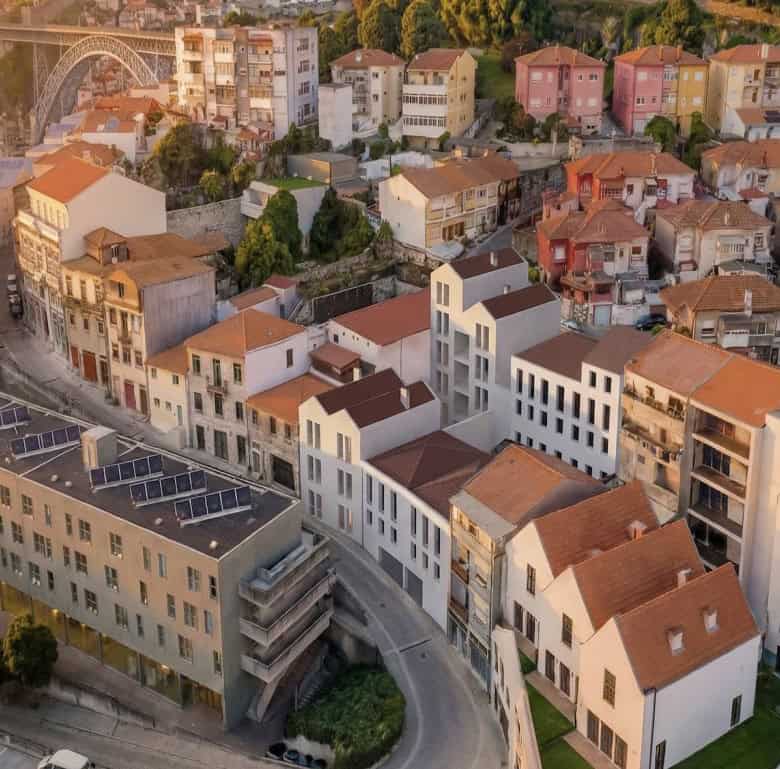 Aerial view of Pilar Apartments in Porto, Portugal, showcasing contemporary residential buildings.