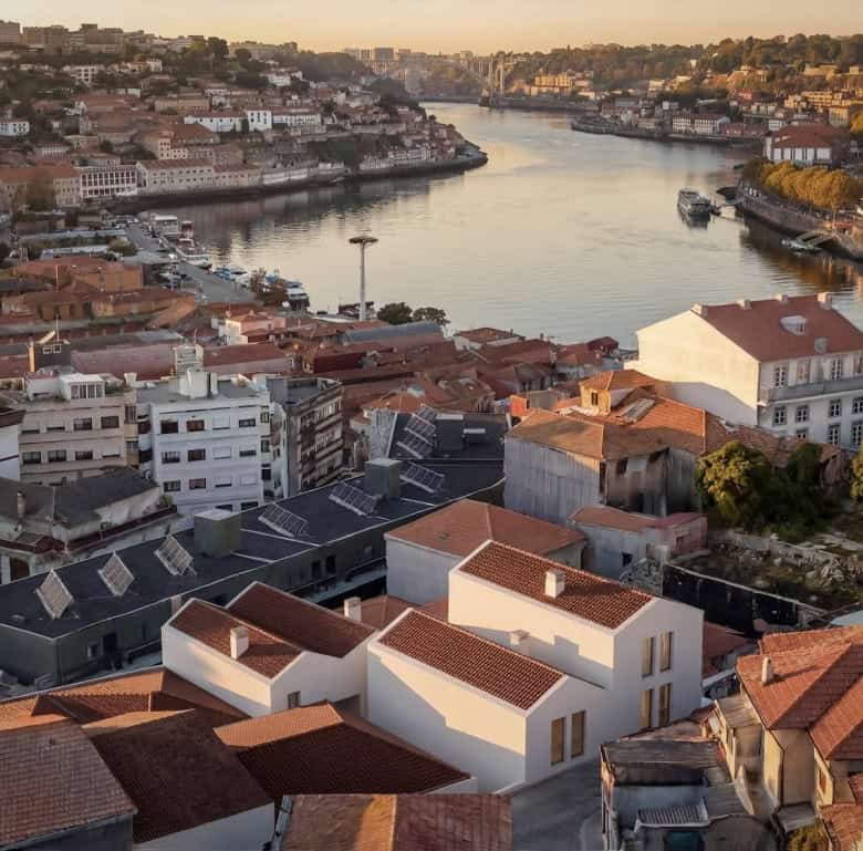 Porto riverfront with colorful buildings and scenic views in Portugal.