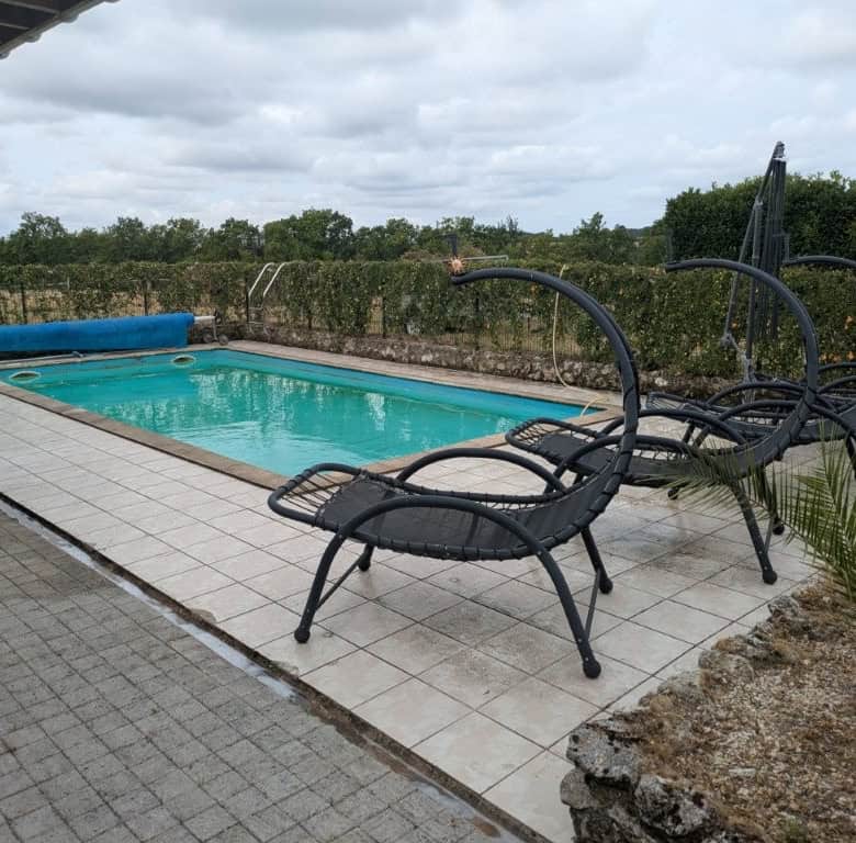 Beautiful outdoor swimming pool at a luxury equestrian property in Chatignac, France. Perfect for re.
