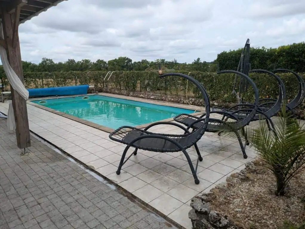 Beautiful outdoor swimming pool at a luxury equestrian property in Chatignac, France. Perfect for re.
