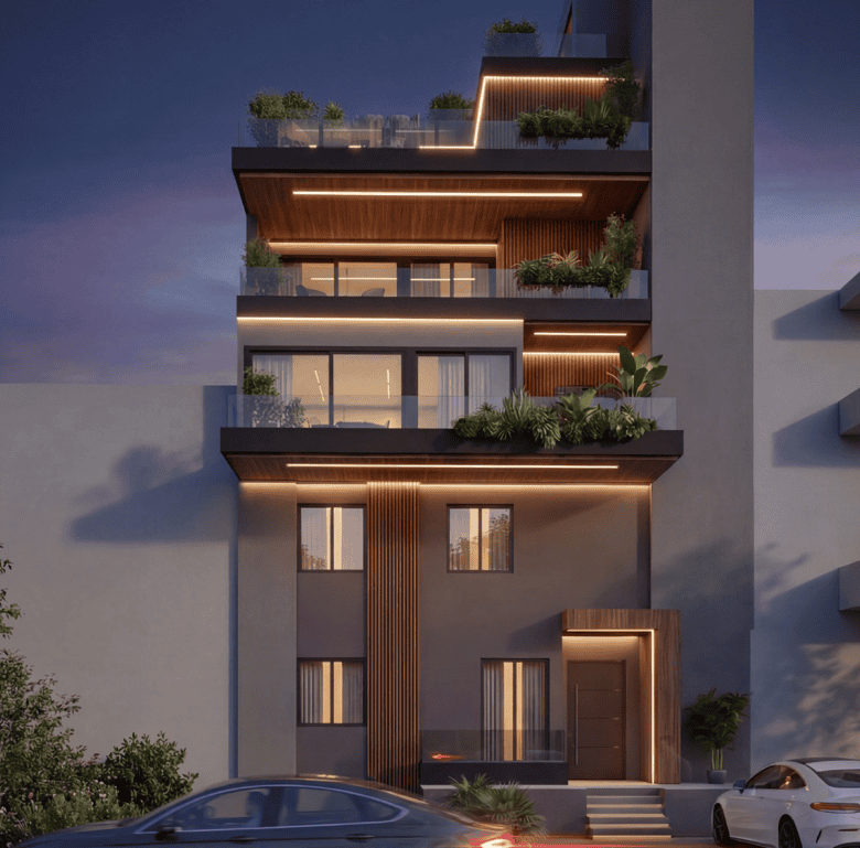 Modern apartment building with spacious balconies and greenery in Athens, Greece.