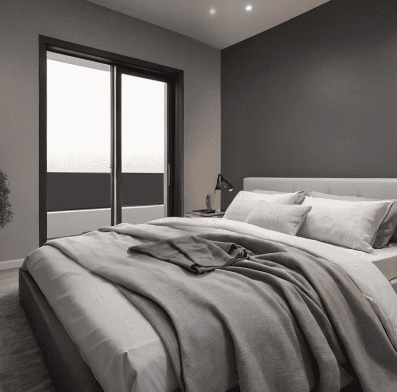 Modern bedroom with large window and minimalist decor.