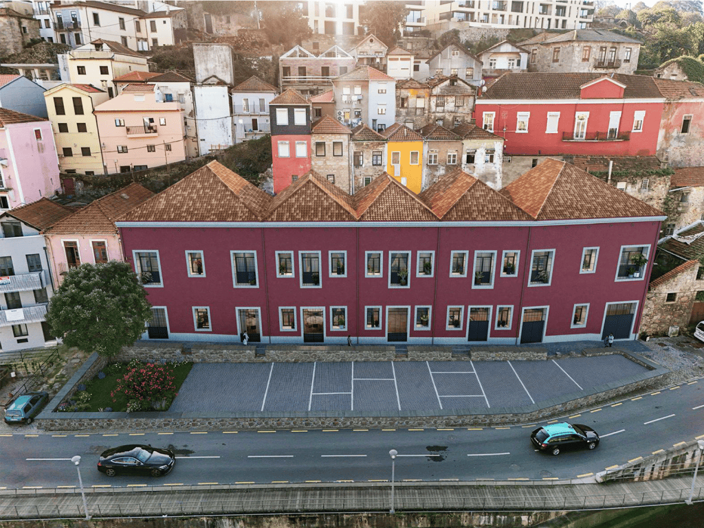 Brightly painted residential buildings in Porto, Portugal, showcasing local architecture and vibrant.