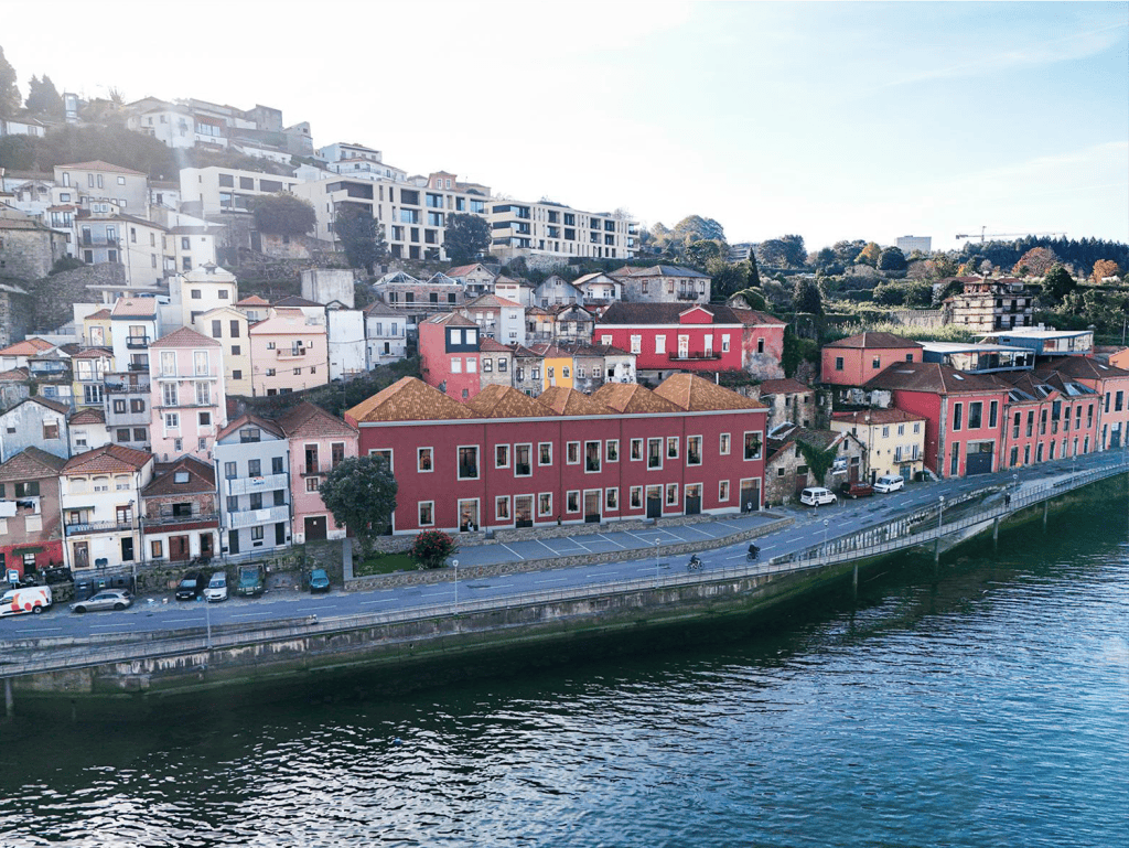 Porto Portugal colorful hillside houses by the river.