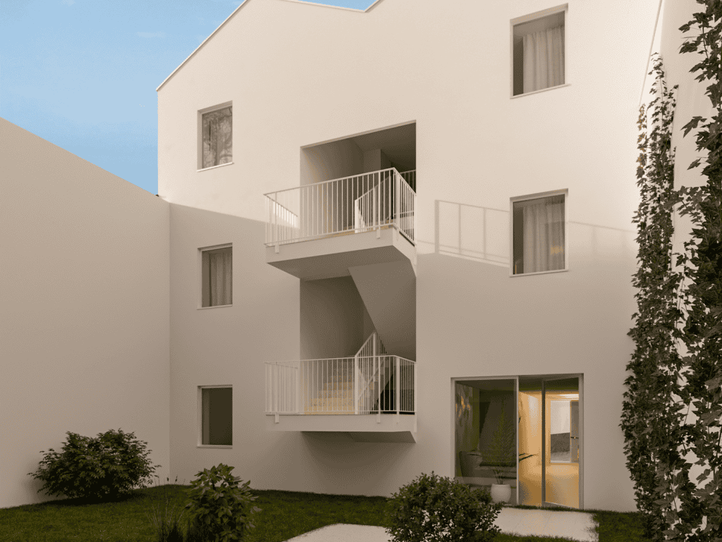 Contemporary Porto apartment building with balconies and garden view.