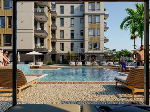 Modern apartment complex with pool in Ravda city center.