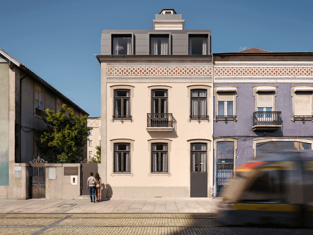 Lighthouse building in Matosinhos, Portugal, with classic architecture and modern rooftop extension.
