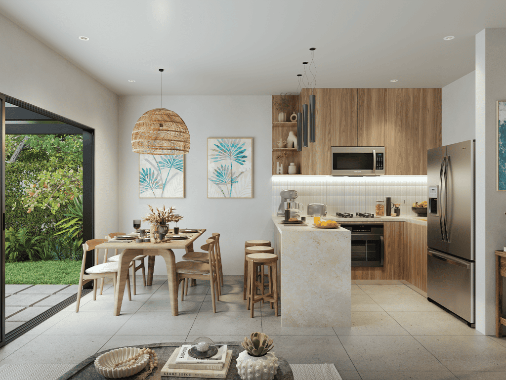 Costa Rican kitchen with dining space and garden view.