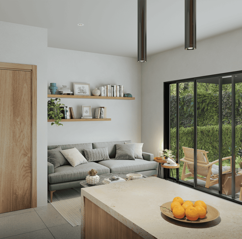 Modern living room with large glass doors overlooking lush garden in Jaco, Costa Rica.