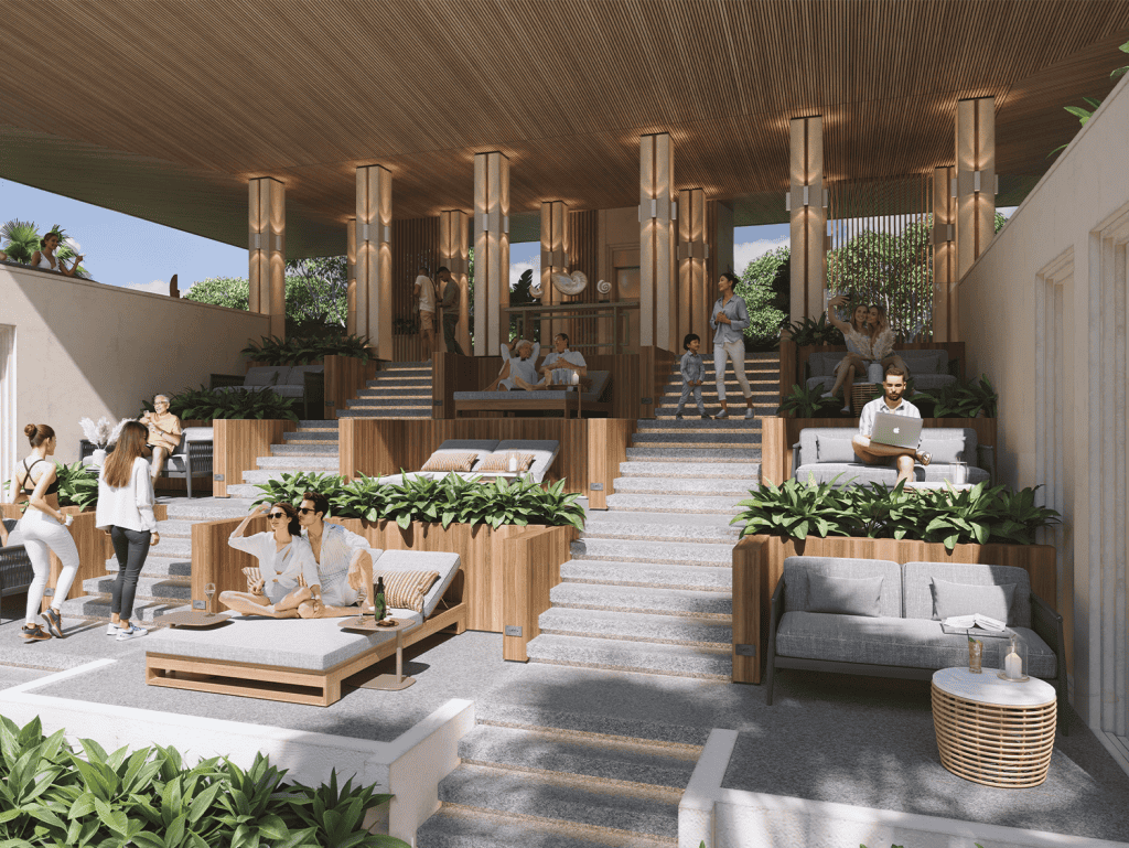 Outdoor lounge area with seating and greenery at Sudara, Phuket, Thailand.