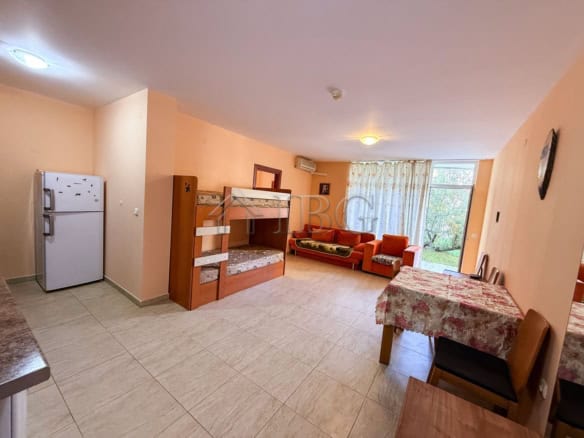 Bright 1-bedroom apartment with a lush green yard in Sun Village, Sunny Beach. Perfect for relaxing.