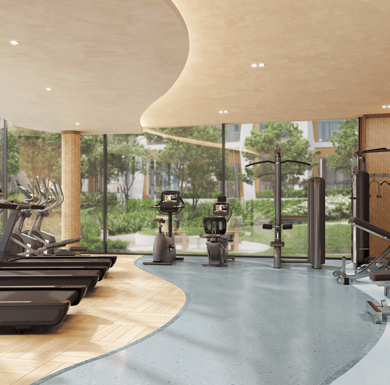 Gym interior with treadmills, exercise bikes, and weight machines in Phuket, Thailand.