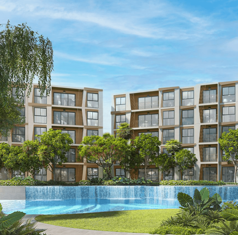 Beautiful residential buildings with lush greenery and a swimming pool.