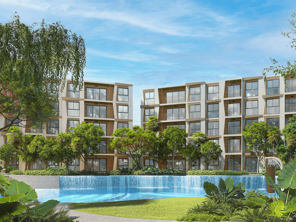 Beautiful residential buildings with lush greenery and a swimming pool.