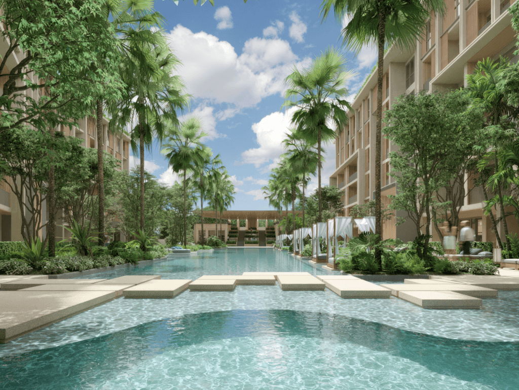 Beautiful swimming pool with lush greenery at Sudara, Phuket, Thailand.