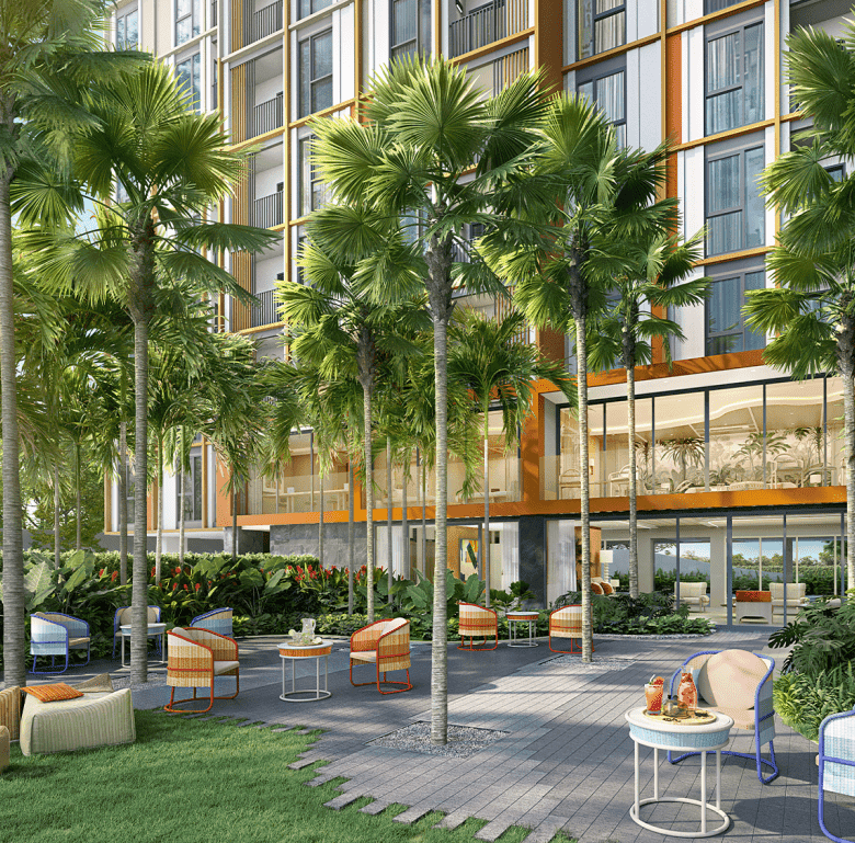 Modern Phuket hotel with lush garden and outdoor seating area for relaxation and leisure.